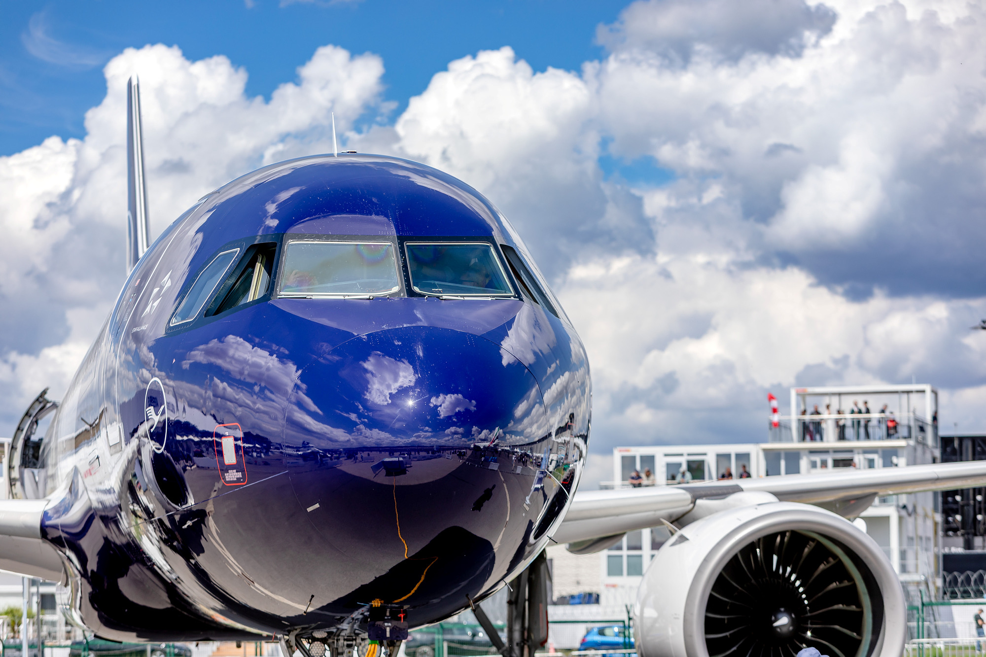 Reflective dark blue nose of the Lufthansa Airbus A320neo in the static display