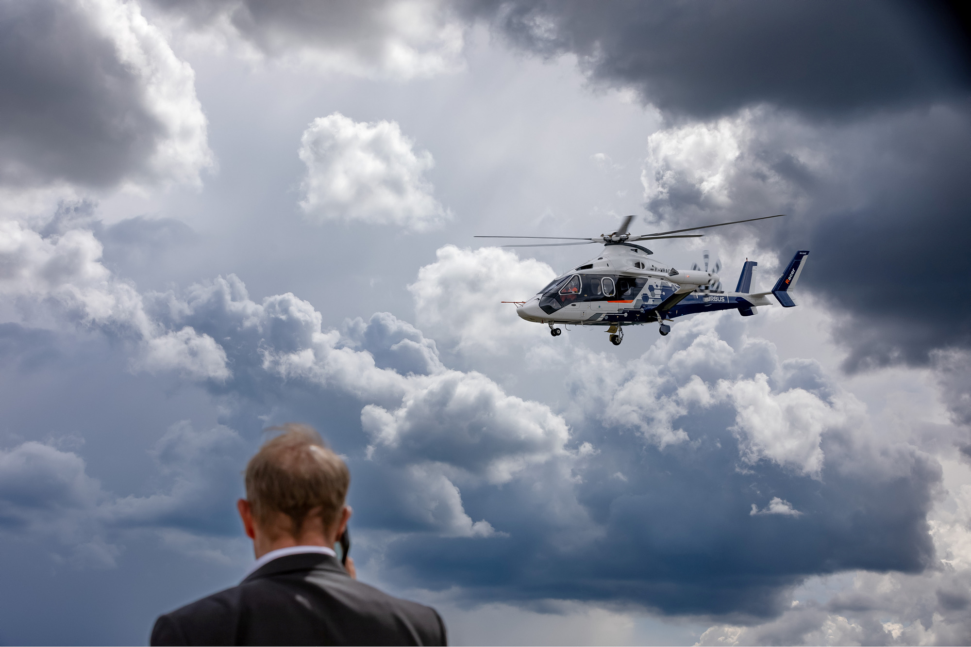 Airbus Racer in the flying display against dramatic storm clouds