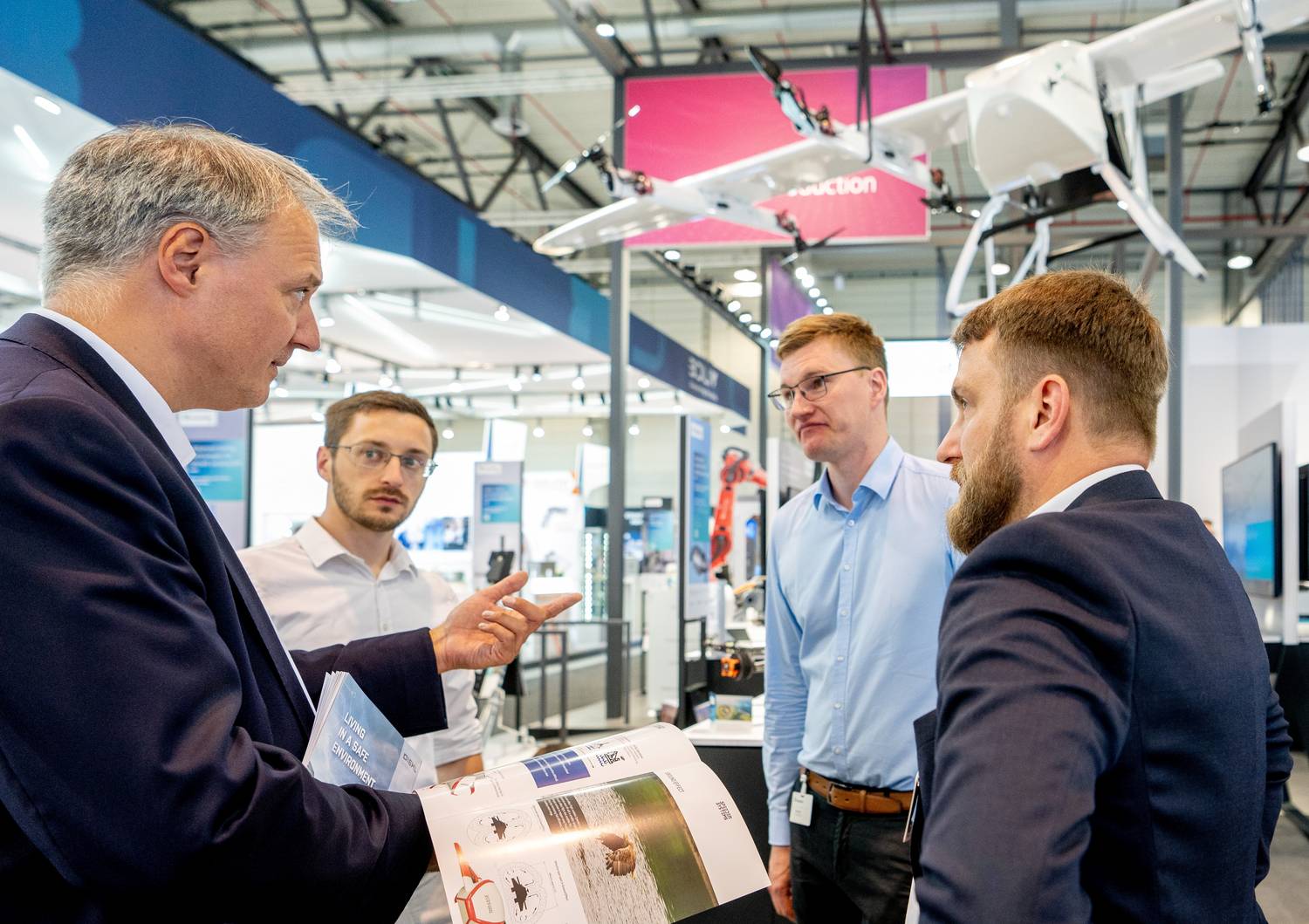Two trade visitors in conversation